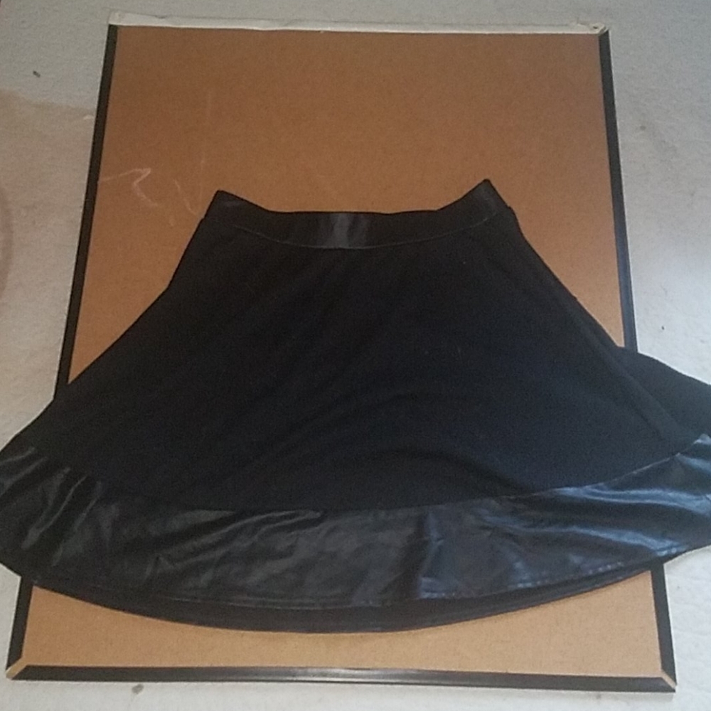 Leather edged black skirt
